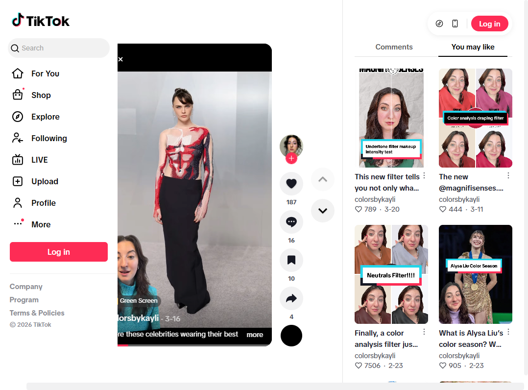 Celebrity in a dramatic outfit with a red and black painted print top