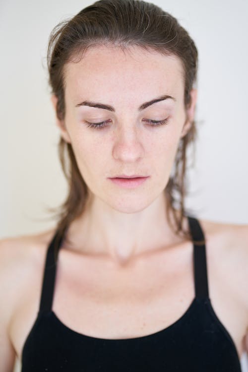 Unfiltered selfie with natural skin texture and true colors visible — taken in natural light with no phone filters